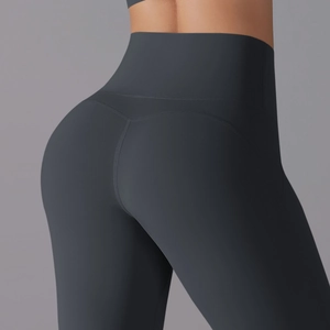 Detail of high-waist charcoal yoga pants featuring a flattering V-shaped back seam