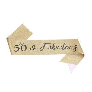 Glittering gold birthday sash with 50 & Fabulous print and crown icon for 50th party
