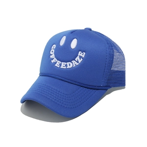 Detail of navy blue trucker hat with COFFEEDAZE embroidery and breathable mesh