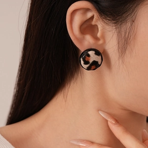 Vintage leopard print round stud earrings featuring a textured faux leather finish for women