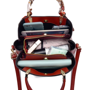 Elegant red wedding tote bag with silk scarf handle and spacious interior storage