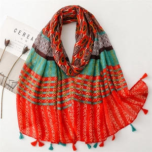 Ethnic geometric pattern scarf with colorful tassels for sun protection and travel wear