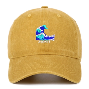 Vintage mustard yellow washed cotton baseball cap featuring ocean wave embroidery