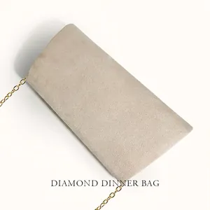 Elegant light gray velvet clutch bag for evening party with golden metal chain strap