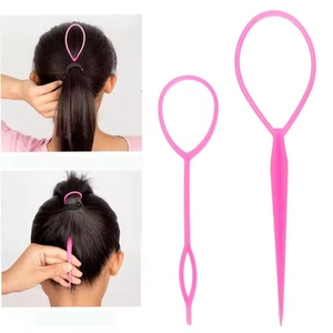 Detail view of pink hair styling loop tools with step-by-step braiding demonstration
