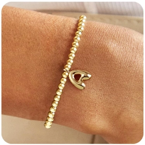 Fashionable 18k gold-plated beaded elastic bracelet with a puffy heart pendant for women