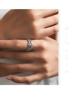 Detail of s925 silver honeycomb ring with openwork lace and pavé diamond setting