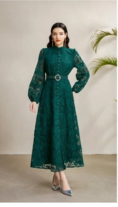Detail of dark green lace maxi dress featuring victorian collar and lantern sleeves