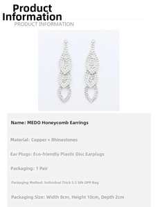Macro shot of layered silver-tone water drop earrings with rhinestone accents and copper base