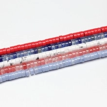 Close-up of assorted colorful heishi natural stone spacer beads for DIY jewelry making