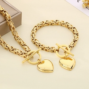 Polished gold Byzantine chain necklace and bracelet set with heart pendant and OT clasp