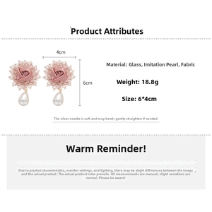 Detail view of pink fabric rose earrings with pearl drops and beads, measuring 6x4cm size