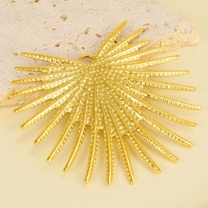 Close-up of golden fan-shaped pendant with detailed granular texture in 304 stainless steel