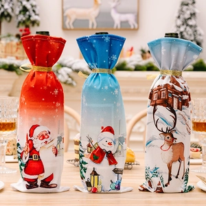 Detailed view of Christmas wine bottle bags with Santa, Snowman and Reindeer prints