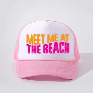 Detailed front view of pink and white trucker hat with MEET ME AT THE BEACH slogan
