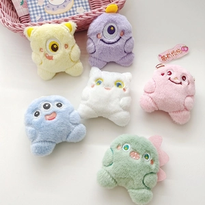Set of six colorful plush monster charms with embroidered eyes and metal chains