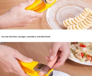 Detailed view of yellow manual slicer cutting banana and sausage on a wooden table