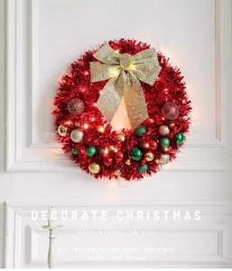 Detail of 45cm Christmas wreath with LED lights, red tinsel, and golden glitter bow
