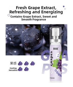 Macro view of 20ml grape breath freshener spray with fresh water droplets background