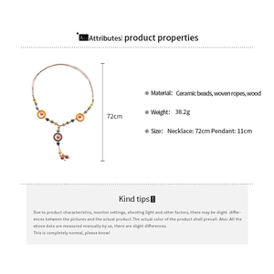 Ethnic handmade ceramic bead necklace detail showing 72cm length and 11cm tassel pendant