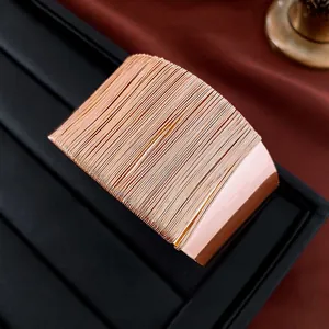 Exaggerated geometric open cuff bracelet in rose gold with brushed metal texture