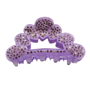 Elegant purple hollow hair claw clip with rhinestones for high-end bun hairstyles