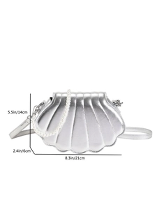 Silberne Handtasche in Muschelform mit Perlen Griff und Maßangaben in Zentimetern