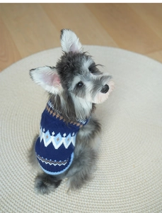 Detailed Fair Isle geometric pattern on navy blue knitted dog sweater for pets