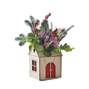 Mini lighted Christmas tree in a wooden box with pine branches and red berries for tabletop decor