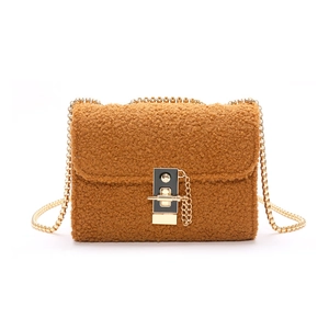 Brown teddy fleece crossbody bag with gold chain strap and decorative turn lock