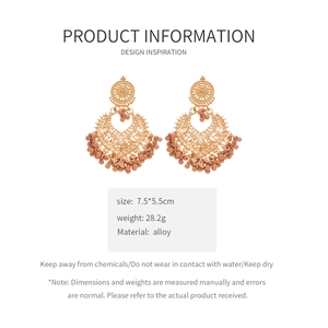 Detailed spec sheet showing dimensions and alloy material for ethnic tassel earrings