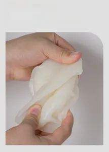 Close-up of highly elastic silicone skull mold being pulled without any deformation