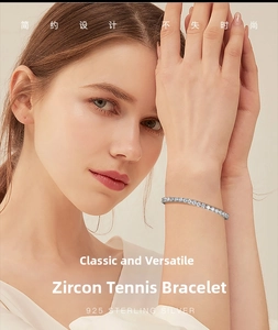 Detail of 925 sterling silver tennis bracelet with 3.0mm round zircons on model wrist