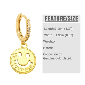 Detailed view of gold smiling face earrings with zircon inlay and LoveMe engraving