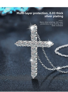 Macro detail of moissanite cross pendant with 0.03 silver plating and long chain