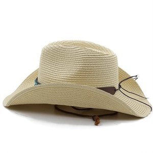Close-up of woven straw hat featuring a brown leather band and turquoise bead details