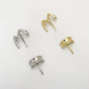 Minimalist gold and silver wavy metal stud earrings set with polished finish