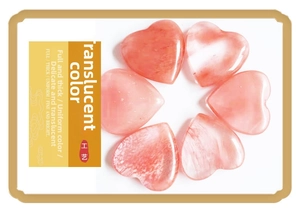 Detail of pink crystal heart stones with smooth polished edges and natural texture