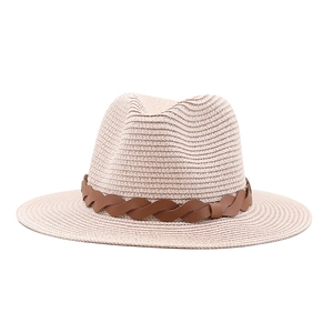 Classic beige woven straw fedora hat with a dark brown leather band for outdoor sun protection