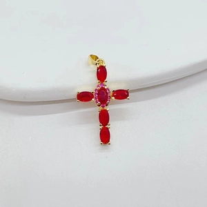 Gothic gold cross pendant necklace with oval red gemstone and pink center crystal
