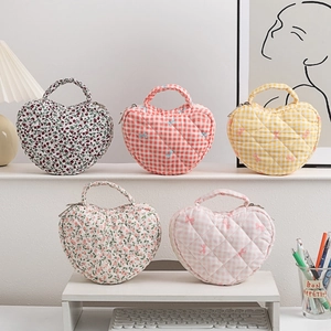 Floral quilted heart-shaped cosmetic bags with top handles and zipper closure