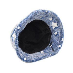 Detail view of the plush bucket hat featuring blue star patterns and black interior lining