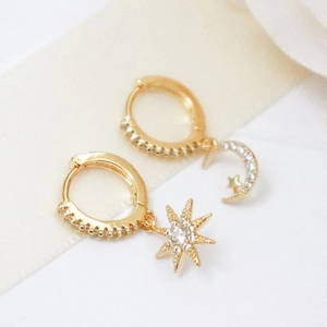 Asymmetric S925 sterling silver celestial earrings with moon and star zircon charms