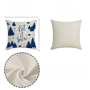 Close-up view of linen texture and blue reindeer print on a Christmas pillowcase