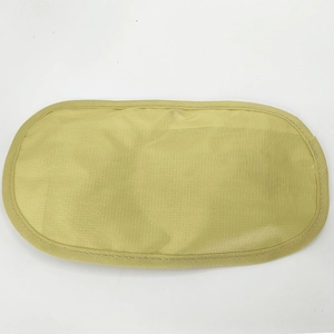 Detail of a yellow oval woven fabric security belt accessory with stitched edges