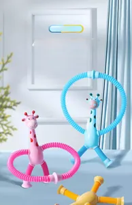 Detail of suction cup giraffe toys showing flexible tubes and colorful LED lights