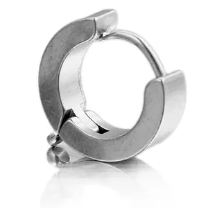 Detailed close-up of a silver polished stainless steel huggie earring with hinge closure