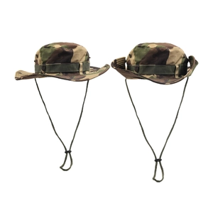 Detailed side view of two woodland camouflage boonie hats with adjustable chin straps