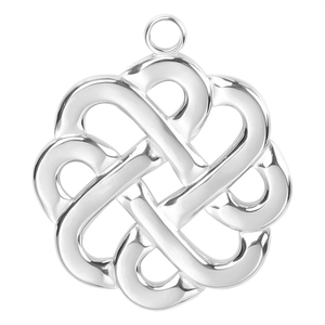 Macro detail showing a polished silver witch knot pendant with intricate interlocking design