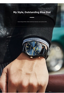 Detail of blue sunray dial watch with dual calendar display and black leather strap